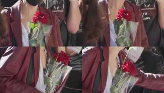 大街上收到红色玫瑰花的女子高清在线视频素材下载