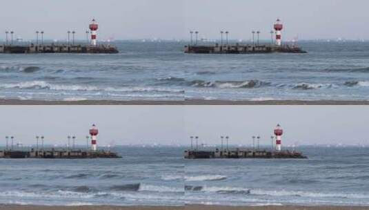 海边的城市灯塔海浪高清在线视频素材下载