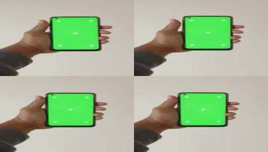 年轻人手部使用绿屏智能手机的Pov镜头高清在线视频素材下载