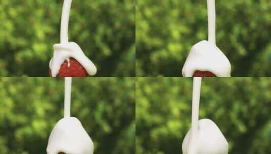 酸奶牛奶挤在草莓上高清在线视频素材下载