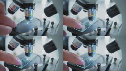 科学家在生物实验室中使用显微镜和实验概念高清在线视频素材下载