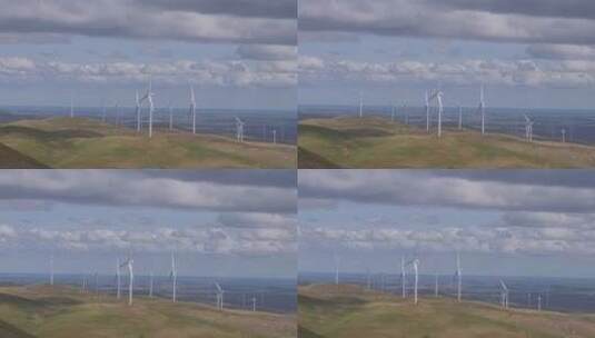 田野上的风力发电机高清在线视频素材下载