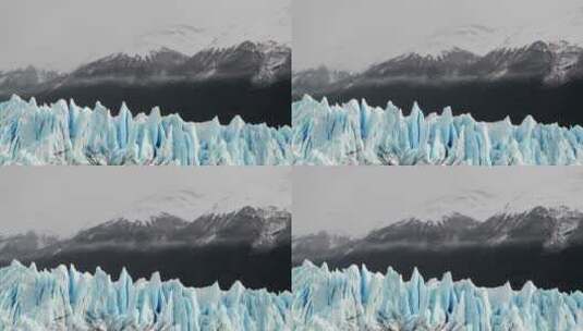 尖刺状的冰川矗立在崎岖的山脉上高清在线视频素材下载