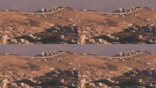 以色列和巴勒斯坦的新安全墙穿过以色列遥远的山丘高清在线视频素材下载