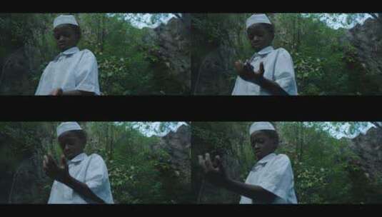 非洲男孩投掷石头高清在线视频素材下载