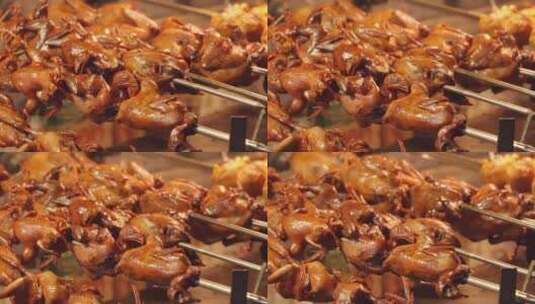 夜市小吃烤鸽子肉高清在线视频素材下载