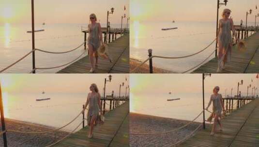 一个女人沿码头走路高清在线视频素材下载