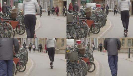  骑着踏板电动车过马路的人高清在线视频素材下载