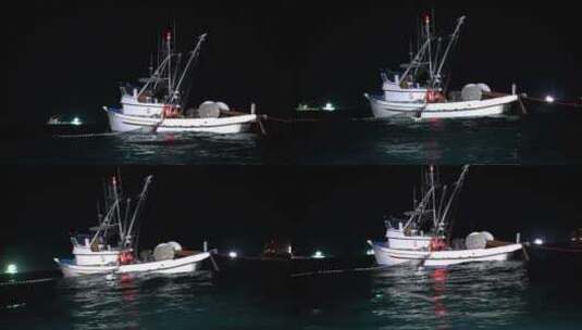 一艘渔船在夜间工作高清在线视频素材下载