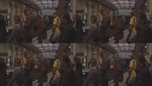伦敦车站站台上等待火车的通勤者高清在线视频素材下载