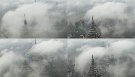 城市上空的云朵触碰到摩天大楼高清在线视频素材下载