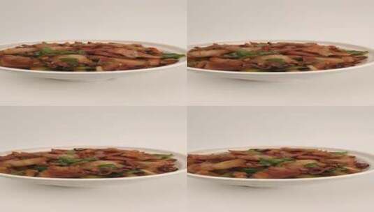 家常菜品墨鱼炒肉4k旋转展示高清在线视频素材下载
