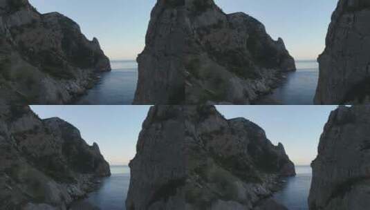 悬崖下风平浪静的海面高清在线视频素材下载