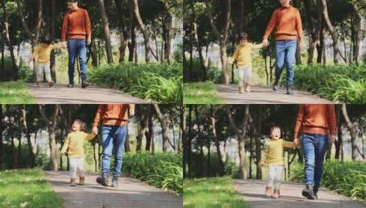 妈妈牵着小女儿的手走在阳光公园小路上高清在线视频素材下载