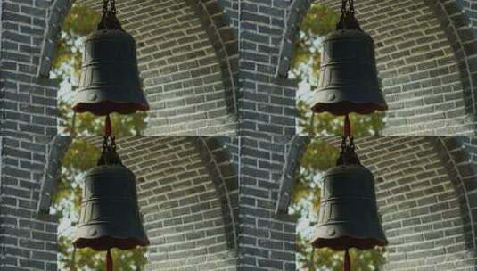 校园里悬挂的古朴的铁钟高清在线视频素材下载