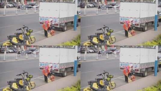 清扫马路的环卫工人实拍镜头高清在线视频素材下载