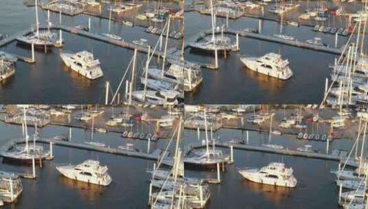 位于路易斯安那州新奥尔良庞恰特雷恩湖码头的白色包租游艇。-艾莉亚高清在线视频素材下载