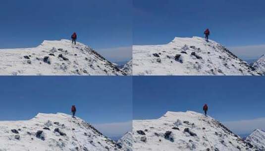 登顶四川阿坝岷山山脉主峰雪宝顶的登山者高清在线视频素材下载