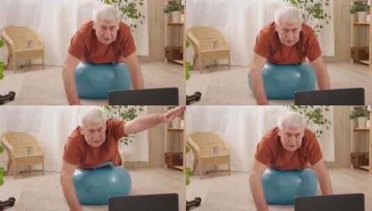 成熟的老人在家做健身锻炼体操在线课程与笔高清在线视频素材下载