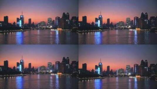 傍晚城市江边日落飞机全景高清在线视频素材下载