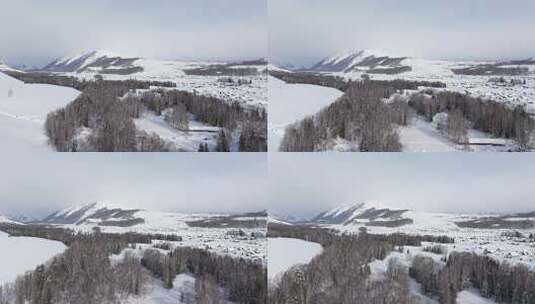 航拍新疆禾木雪景森林雪地小木屋禾木桥雪山高清在线视频素材下载