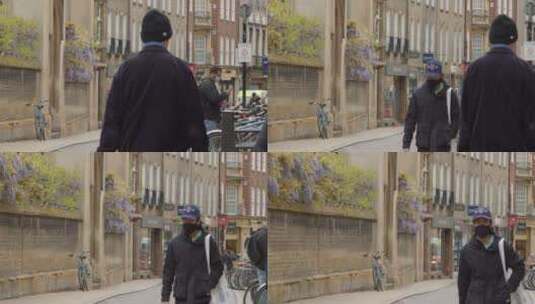 街道上戴口罩的行人高清在线视频素材下载