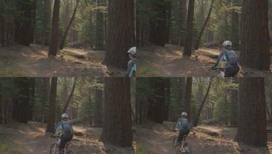 山地自行车手在森林里骑行高清在线视频素材下载