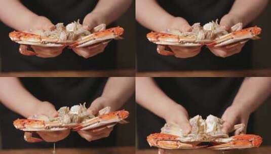 吃螃蟹掰开梭子蟹高清在线视频素材下载