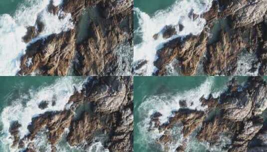 航拍俯瞰海浪击打礁石高清在线视频素材下载