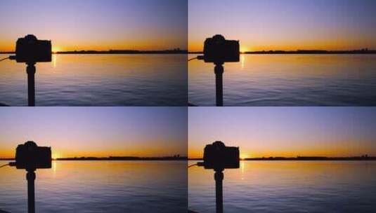 拍摄松花江夕阳落日唯美风光延时的相机高清在线视频素材下载