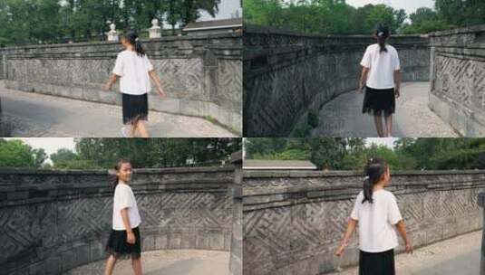 4K实拍在颐和园迷宫黄花阵游玩的中国女孩高清在线视频素材下载