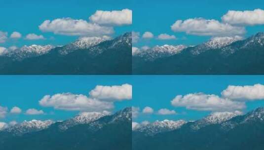 雪山之巅不断变化的云高清在线视频素材下载