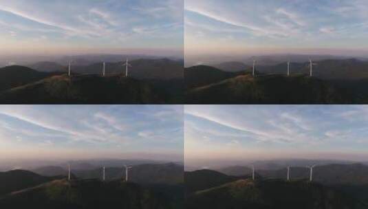 航拍夕阳下山顶风力发电机高清在线视频素材下载