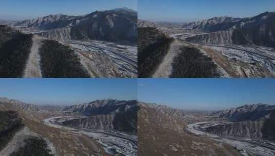 航拍大雪过后的山峰峡谷美景高清在线视频素材下载