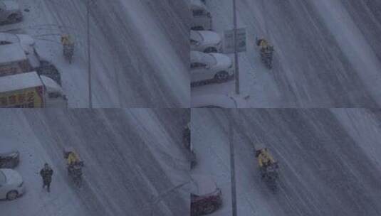 大雪纷飞的天气松外卖的小哥在骑行高清在线视频素材下载