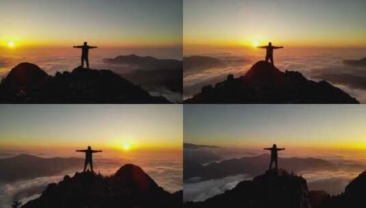 山顶日落下的登山者高清在线视频素材下载