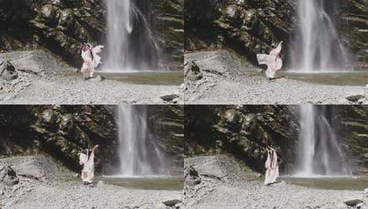 古装美女在瀑布下舞蹈唯美高清在线视频素材下载