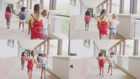 不同女孩在学校走廊散步和交谈的背影视频高清在线视频素材下载