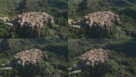 无人机在卡尔卡塔韦基亚周围飞行，卡尔卡塔韦基亚是一个典型的意大利中世纪城镇，站在山顶上高清在线视频素材下载