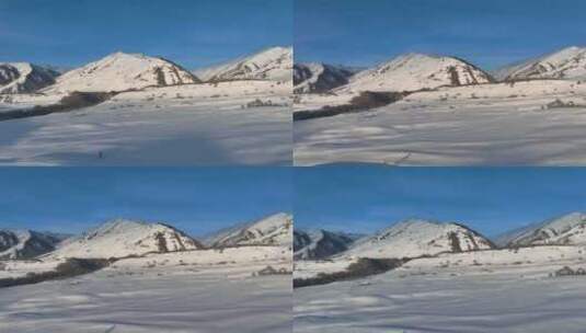 新疆阿勒泰地区禾木风景区雪山自然风光高清在线视频素材下载