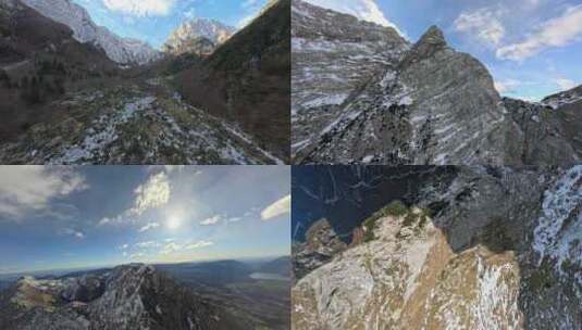 FPV穿越机无人机航拍雪山山脉森林蓝天白云高清在线视频素材下载