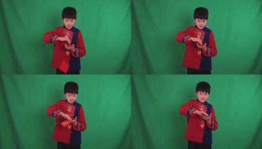 中国小男孩恭贺新年发红包慢镜绿幕抠像高清在线视频素材下载