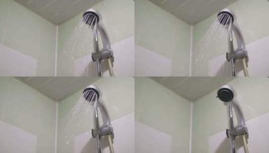 浴室中打开和关闭淋浴喷头的特写镜头慢动作高清在线视频素材下载