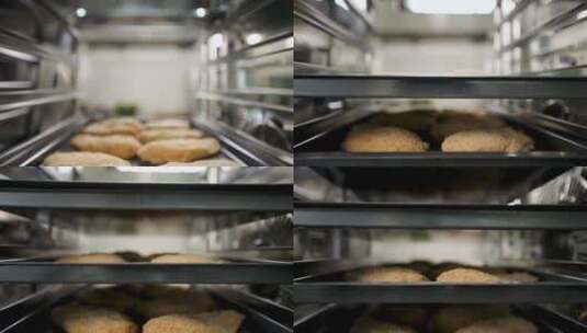 面包店托盘上新鲜出炉的面包，特写镜头，选高清在线视频素材下载