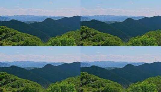 夏季蓝天白云绿色大山山顶全景风光高清在线视频素材下载