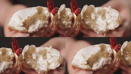 吃螃蟹掰开梭子蟹高清在线视频素材下载