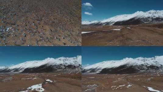 雪山草地视频青藏高原延绵的雪山峡谷平原高清在线视频素材下载