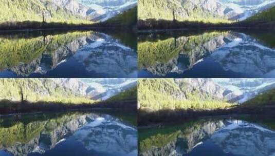 亚丁 雪山湖面飞跃 航拍高清在线视频素材下载
