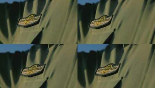 建军节 边防战士绿色军装胸章 特写高清在线视频素材下载