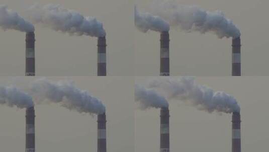 慢镜头升格拍摄工业园区企业排放白烟的烟囱高清在线视频素材下载